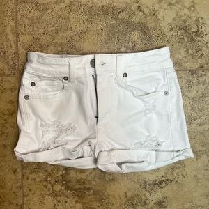 American Eagle white ripped denim shorts